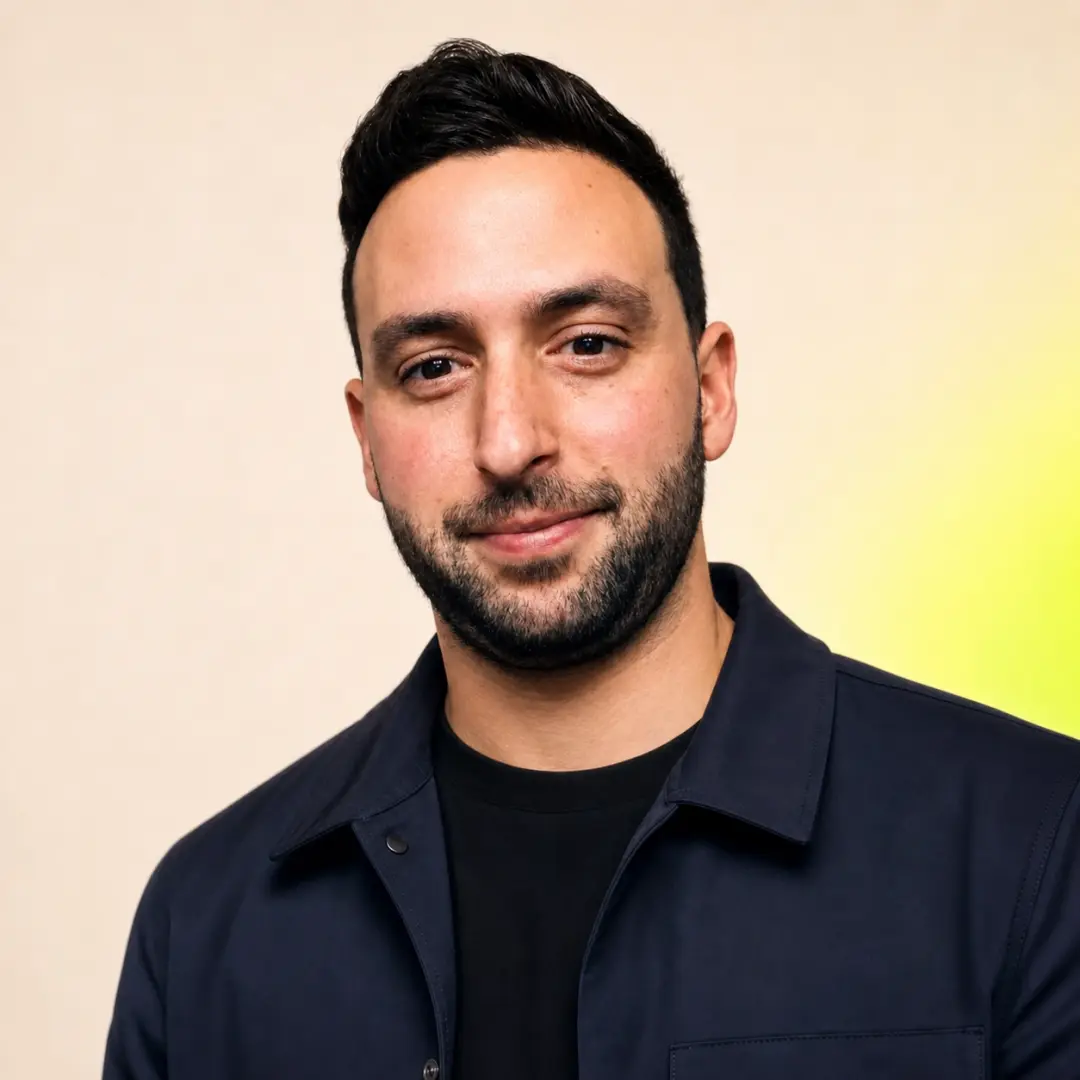 Jarryd Trokis, CTO and co-founder of Super Basic, in a navy jacket against a pale backdrop